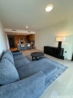 a living room with furniture and a couch