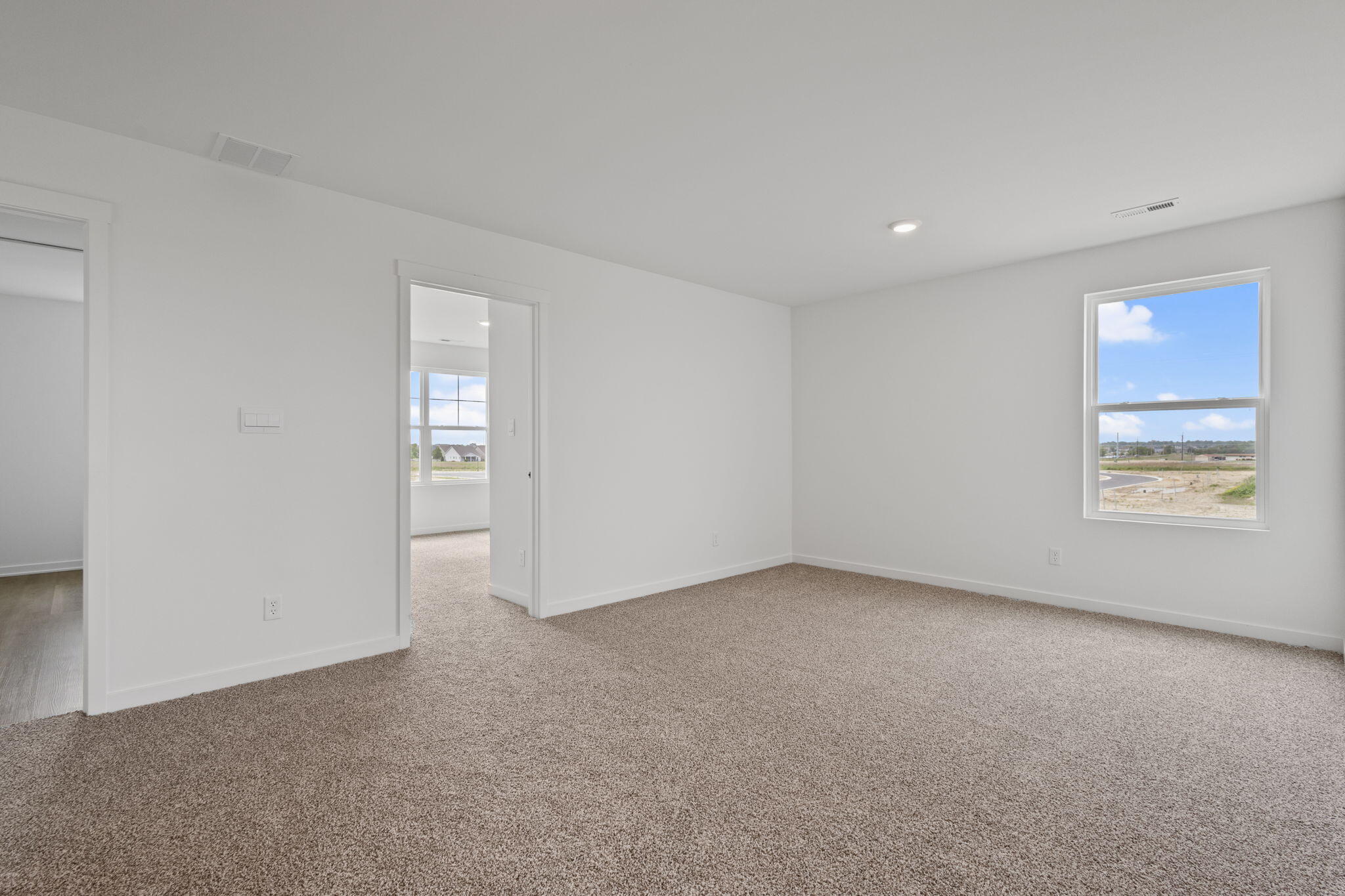 10588 Morse Place Crown Point, IN 46307 - Photo 20 of 28 a view of an empty room with a window