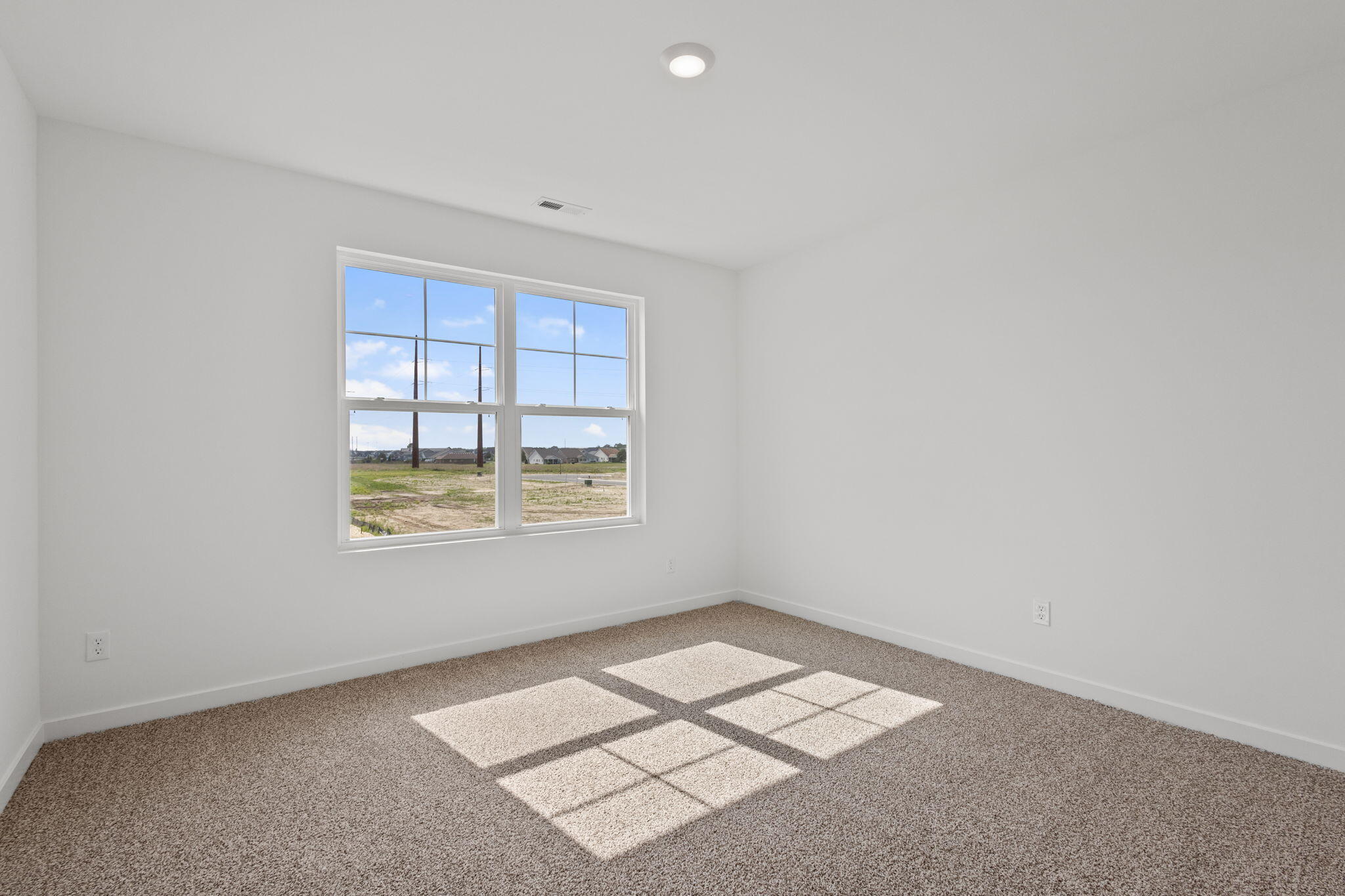 10588 Morse Place Crown Point, IN 46307 - Photo 23 of 28 an empty room with a window