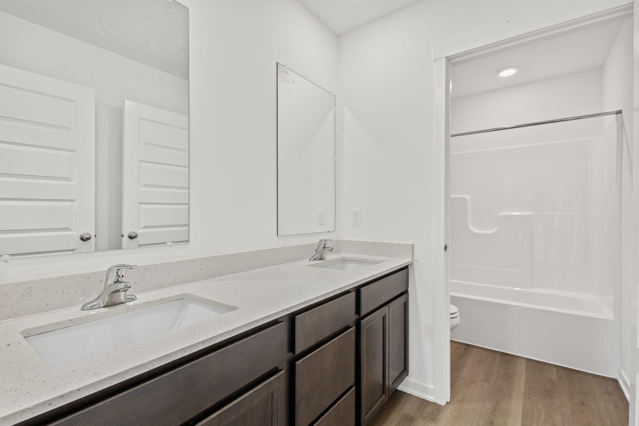 10588 Morse Place Crown Point, IN 46307 - Photo 26 of 28 a bathroom with a sink and a bathtub