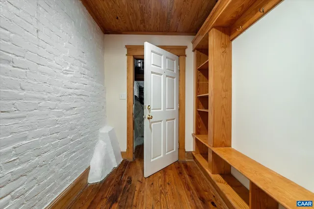 a kitchen with granite countertop a sink and a stove top oven