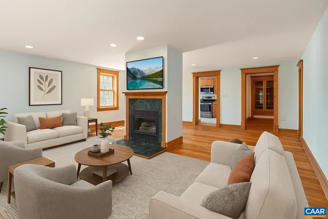 a view of a room with wooden floor and a window