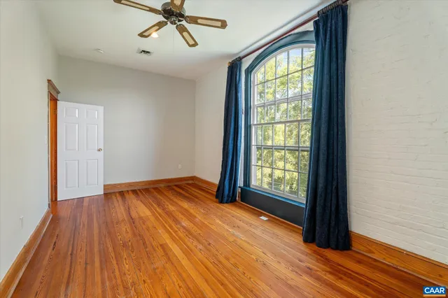 a bathroom with a sink and a window
