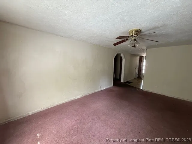 a view of a room with a fan