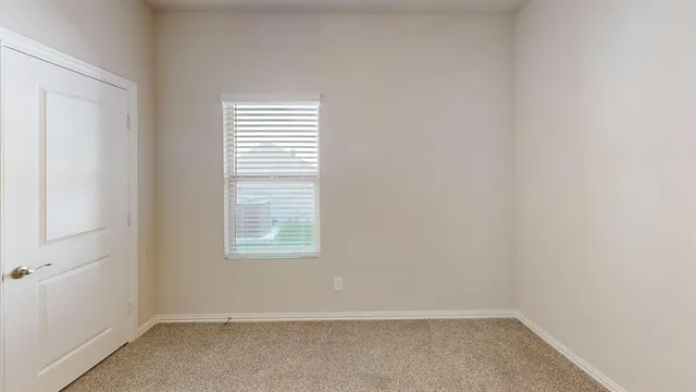 an empty room with a window