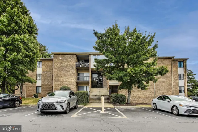 a car parked in front of a house