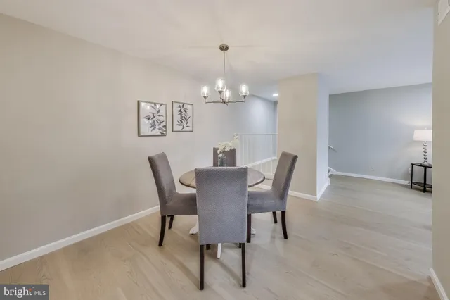 a kitchen with stainless steel appliances granite countertop a stove and a microwave