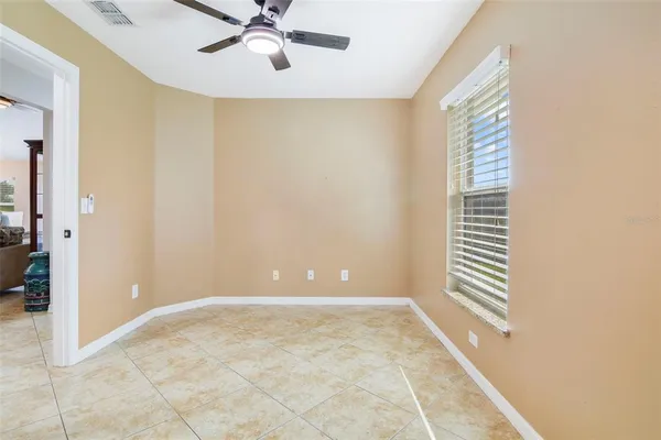 a view of an empty room and window