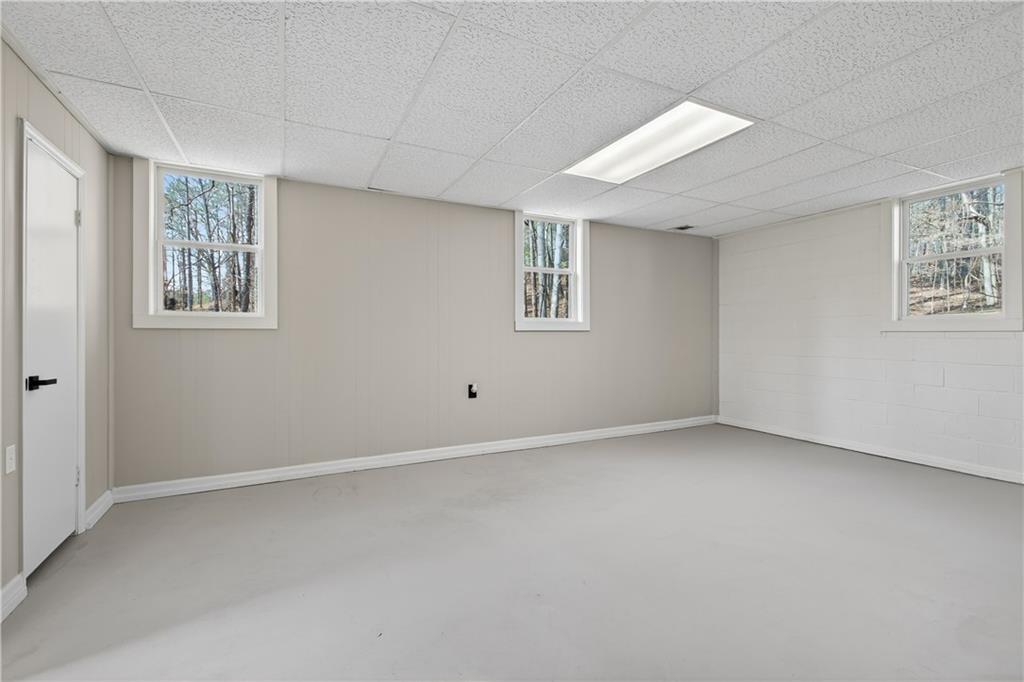 237 Lusk Court Canton, GA 30114 - Photo 18 of 25 an empty room with windows