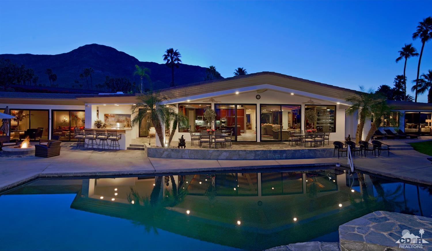 a view of a house with a yard balcony