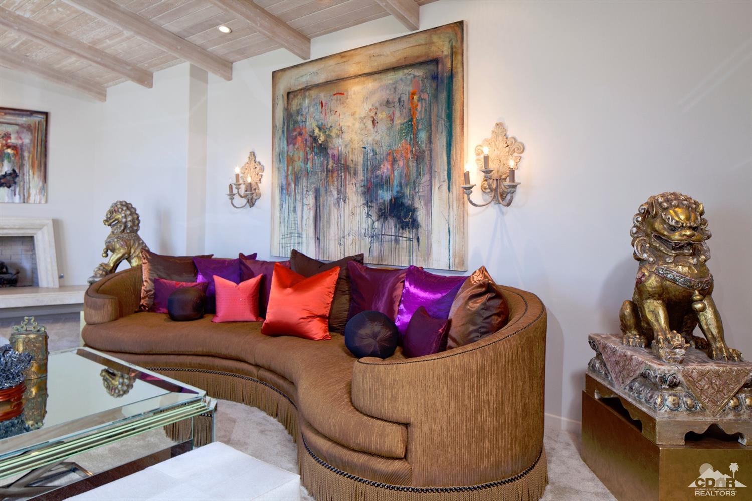 40815 Tonopah Road Rancho Mirage, CA 92270 - Photo 14 of 44 a living room with furniture and painting on the wall