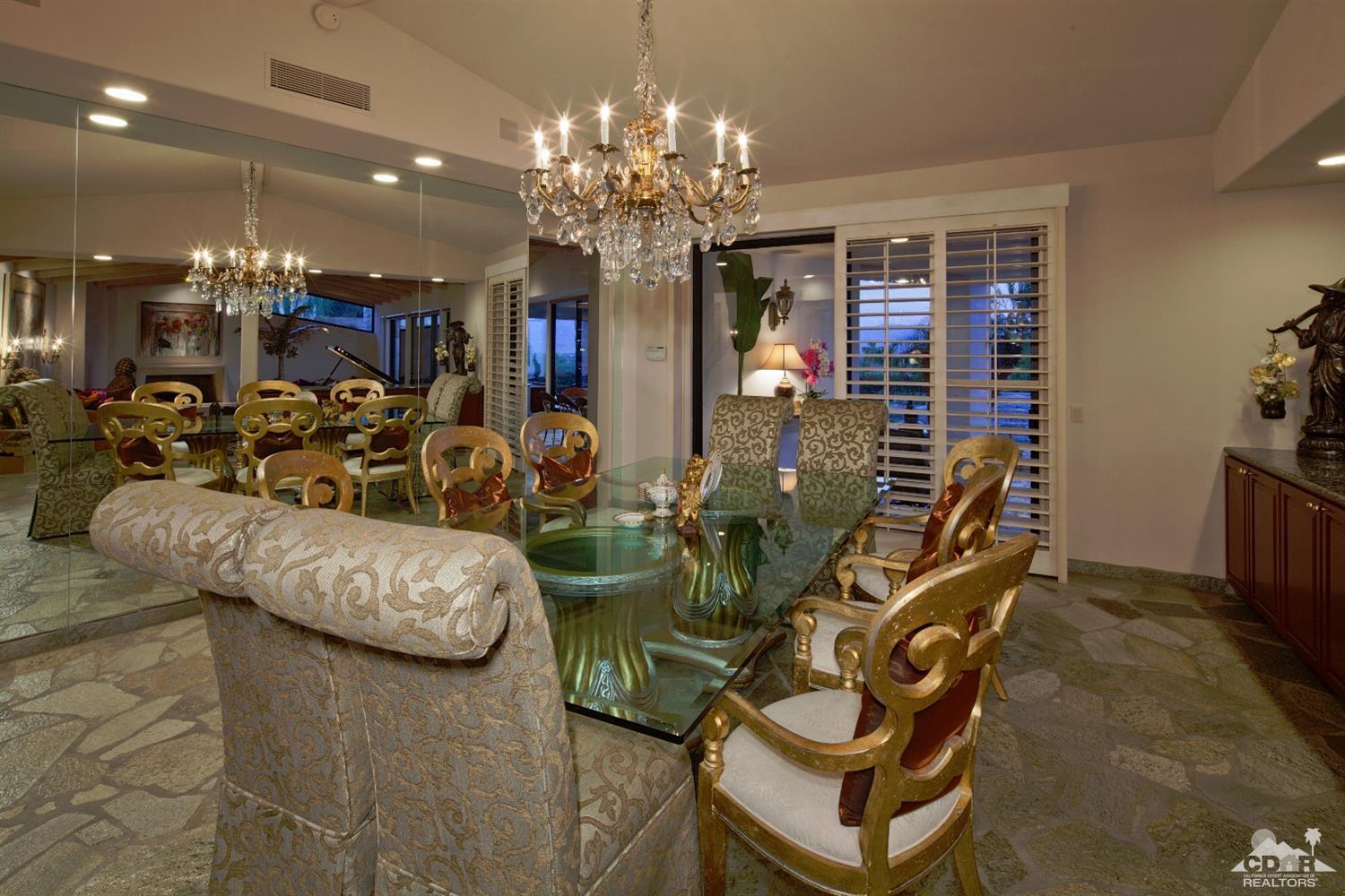 40815 Tonopah Road Rancho Mirage, CA 92270 - Photo 17 of 44 a view of a room with gym equipment