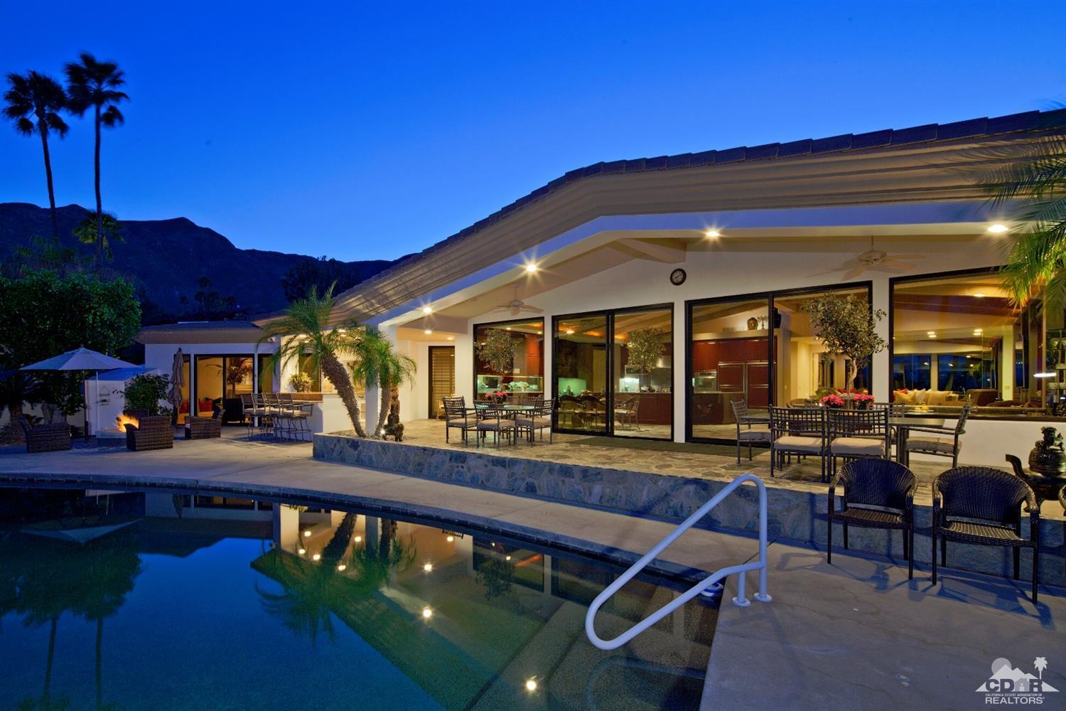 40815 Tonopah Road Rancho Mirage, CA 92270 - Photo 32 of 44 a view of a chairs and tables in patio