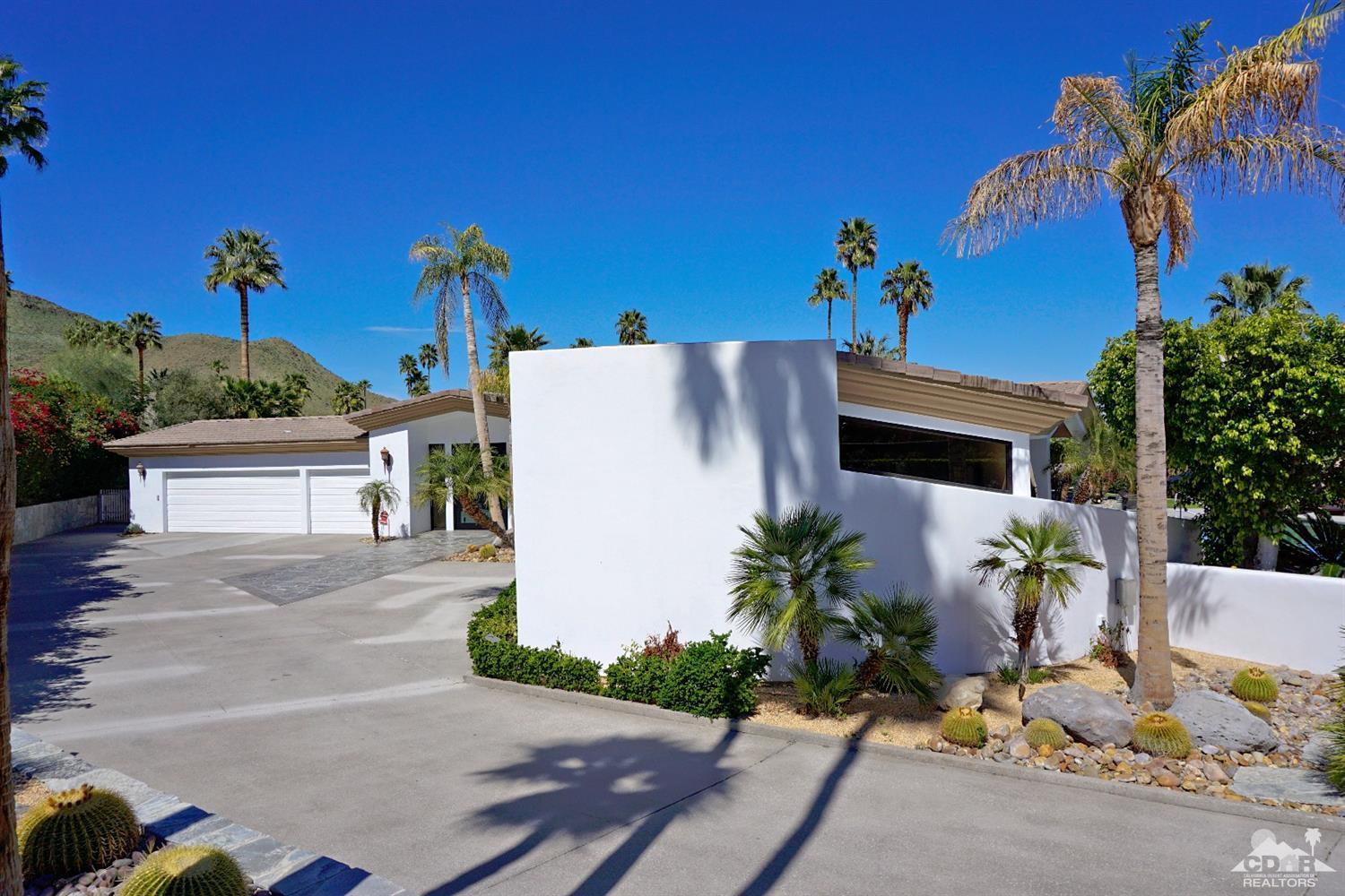 40815 Tonopah Road Rancho Mirage, CA 92270 - Photo 44 of 44 a view of a house with backyard and plants
