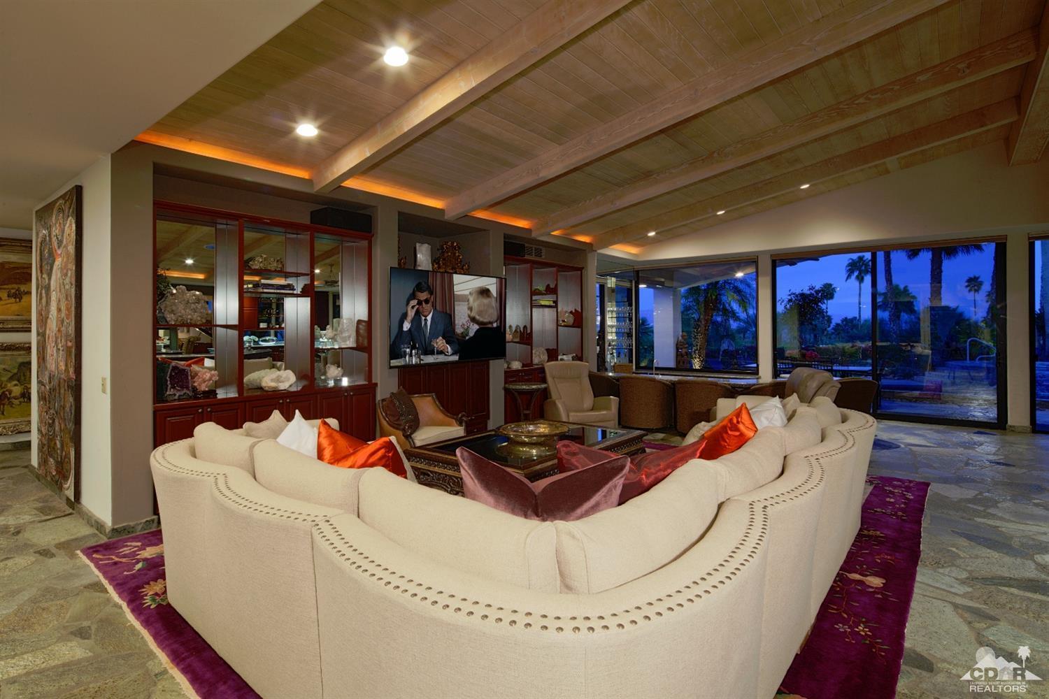 40815 Tonopah Road Rancho Mirage, CA 92270 - Photo 7 of 44 a living room with furniture and a wooden floor