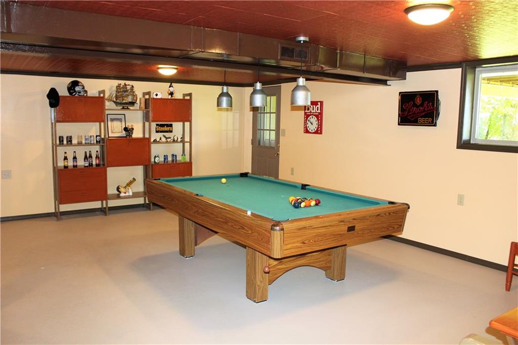 241 Fairview Road Midland, PA 15059 - Photo 17 of 25 Lower Level Game Room with Walk Out to Hot Tub