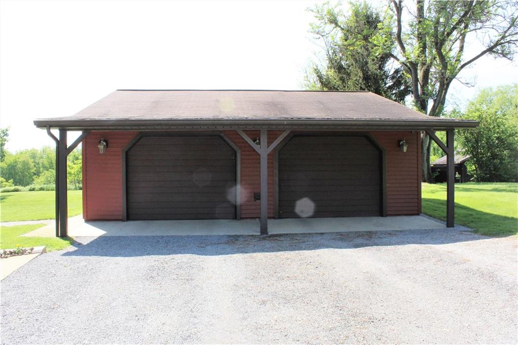 241 Fairview Road Midland, PA 15059 - Photo 24 of 25 2 Car 28x28 Detached Garage with Workshop and 6 Foot Overhang on Front
