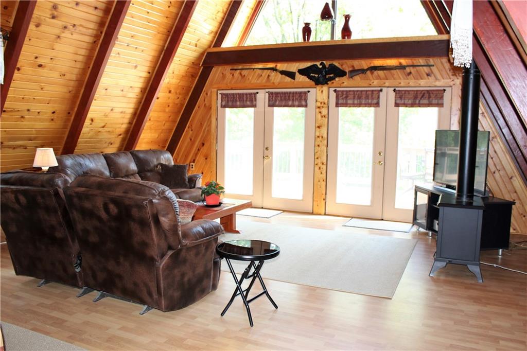 241 Fairview Road Midland, PA 15059 - Photo 4 of 25 2 Story Living Room with Large Windows in Upper Peak
