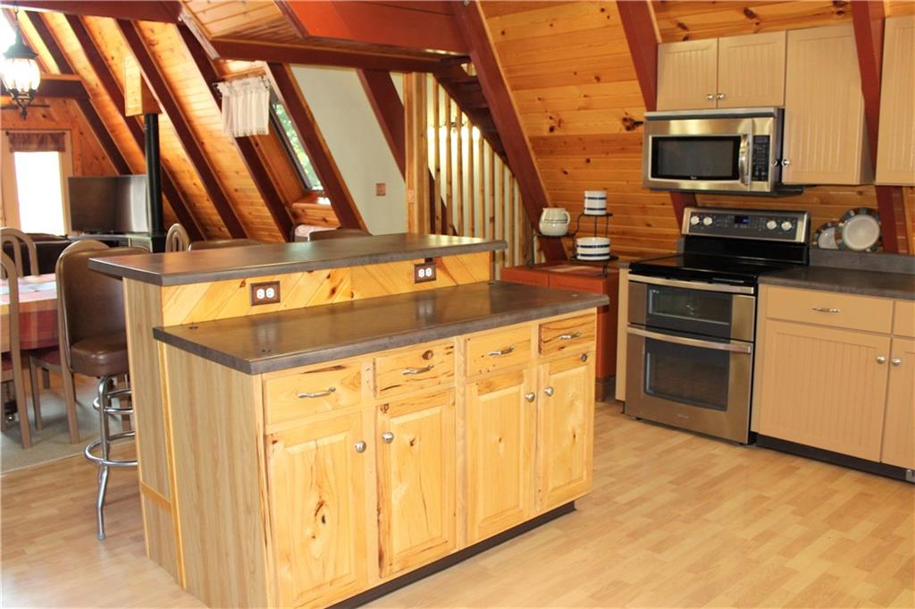 241 Fairview Road Midland, PA 15059 - Photo 6 of 25 Kitchen Has Bar Area with Seating
