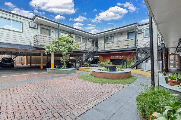 an aerial view of a houses with outdoor space