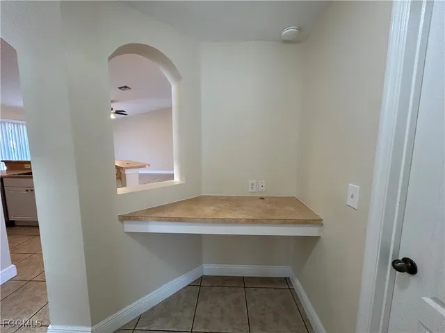 a bathroom with a sink and vanity