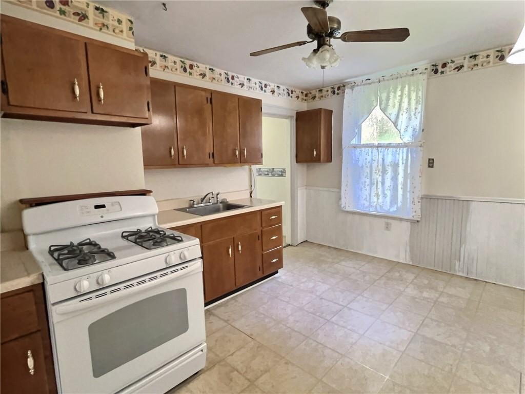 3 Quarry Road Sewickley, PA 15143 - Photo 5 of 18 a kitchen with a stove and a sink
