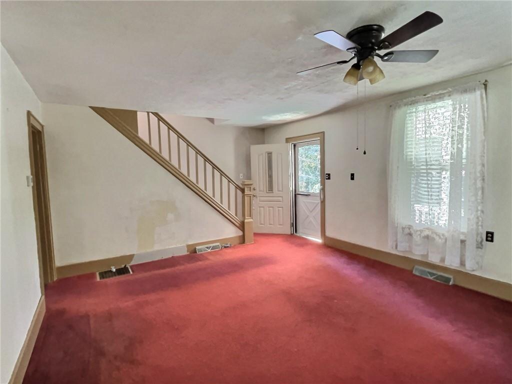 3 Quarry Road Sewickley, PA 15143 - Photo 6 of 18 a view of an empty room with a window
