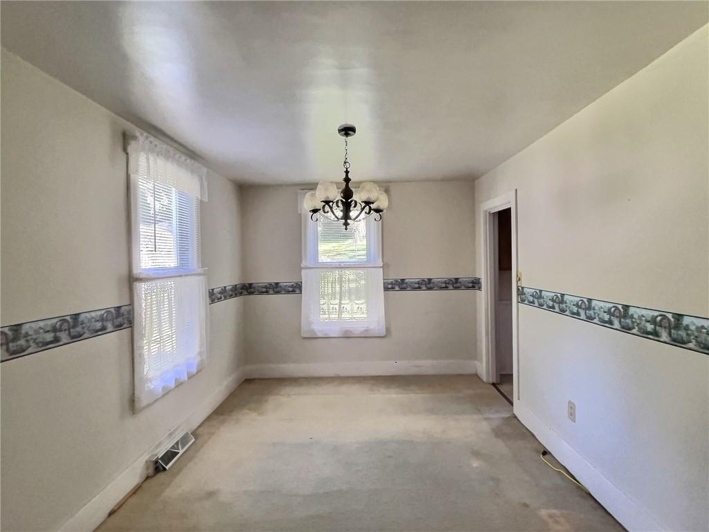 3 Quarry Road Sewickley, PA 15143 - Photo 8 of 18 a view of an empty room with a window