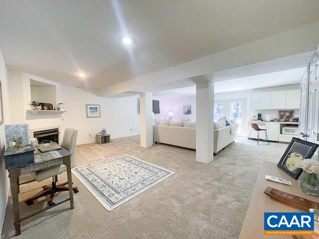 31 Laguna Road Palmyra, VA 22963 - Photo 20 of 39 a living room with furniture and a rug