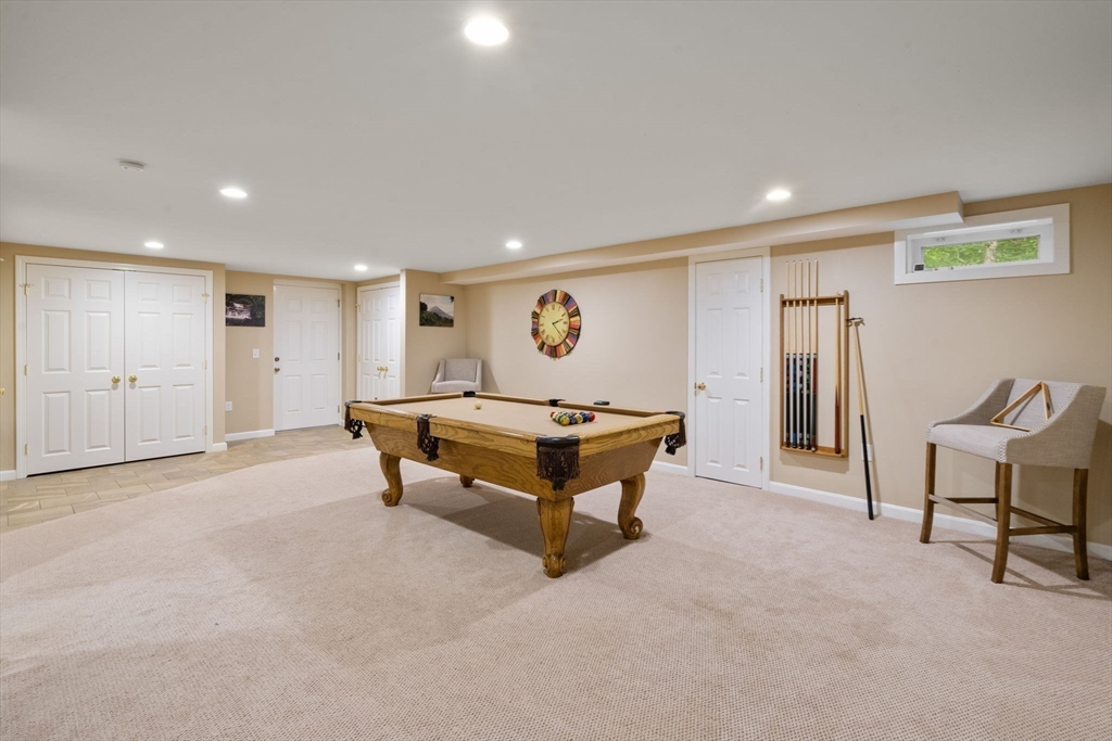 12 Thorny Lea Road Sharon, MA 02067 - Photo 23 of 29 a living room with furniture and a rug