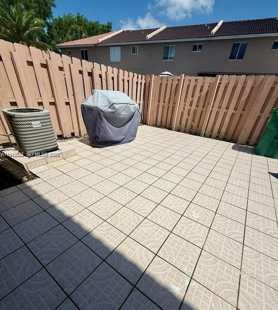 14085 Southwest 179th Terrace Miami, FL 33177 - Photo 23 of 24 a view of outdoor space with wooden fence