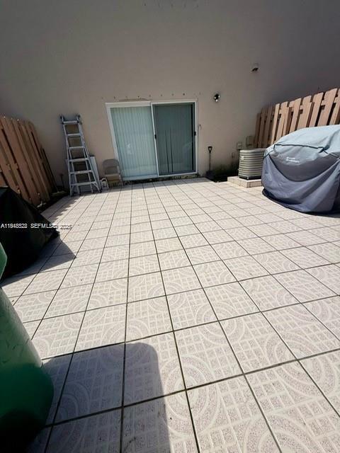 14085 Southwest 179th Terrace Miami, FL 33177 - Photo 24 of 24 a bedroom with a bed and a couch