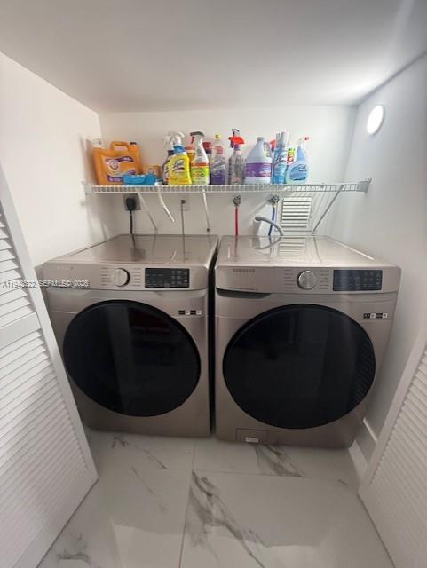 14085 Southwest 179th Terrace Miami, FL 33177 - Photo 7 of 24 a utility room with dryer and washer