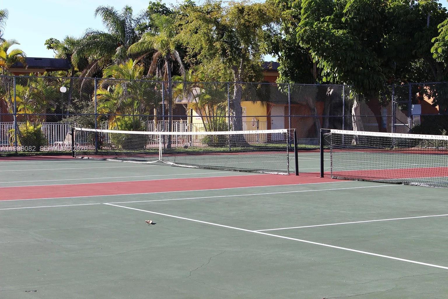 9441 Southwest 76th Street, Unit V33 Miami, FL 33173 - Photo 21 of 21 a view of basketball court