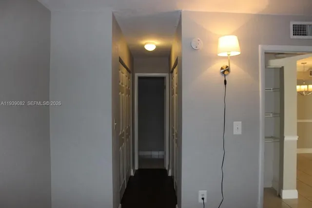 a white toilet sitting next to a bath tub