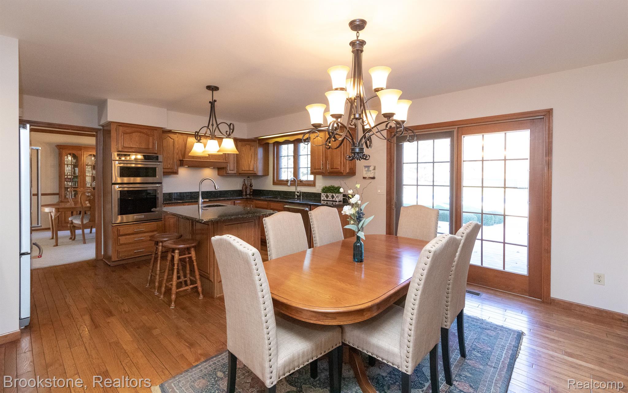 7935 Ranch Estates Road Clarkston, MI 48348 - Photo 20 of 42 Breakfast nook opens to deck