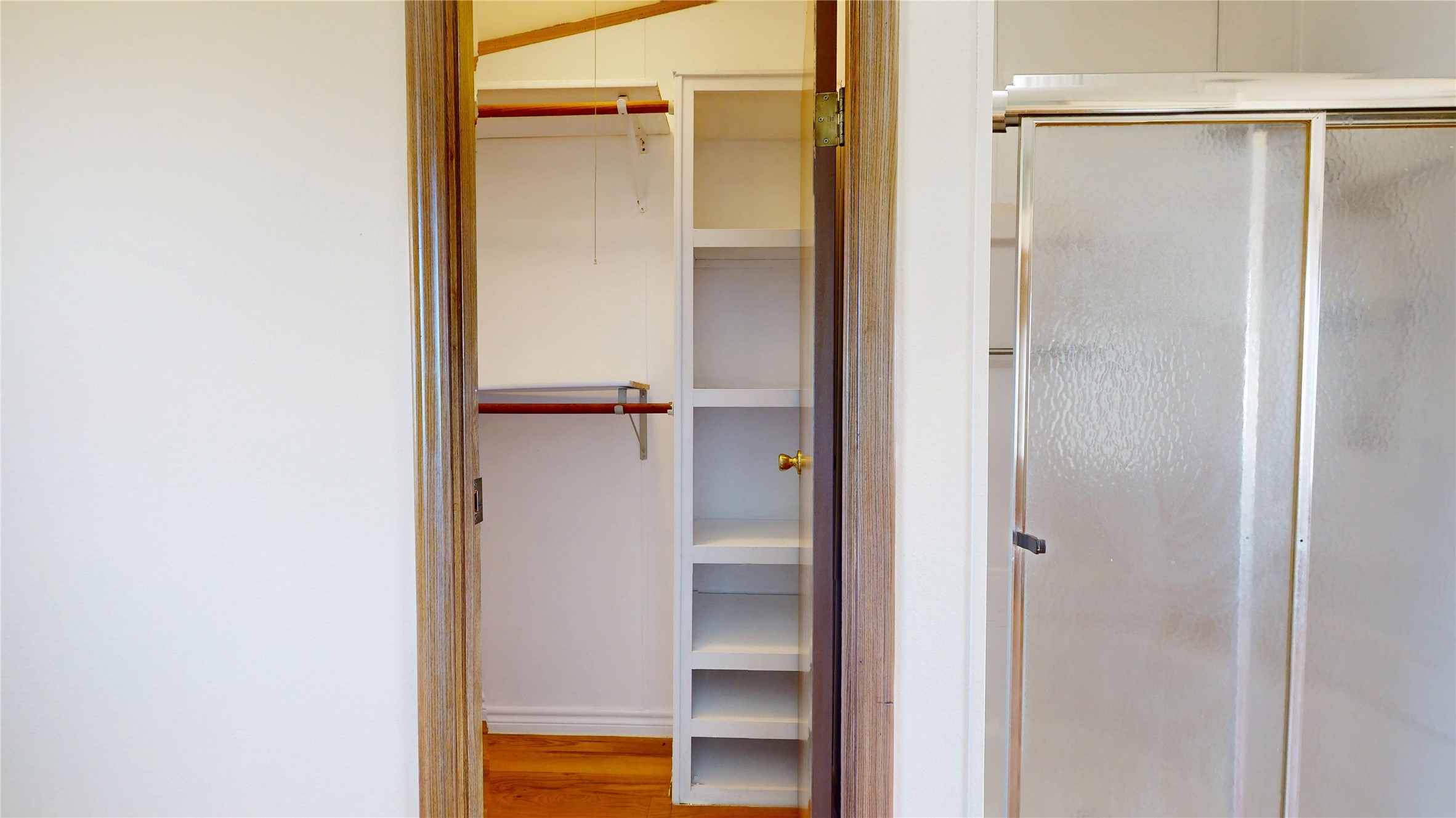 435 16th Street San Leon, TX 77539 - Photo 29 of 44 a bathroom with a glass shower door