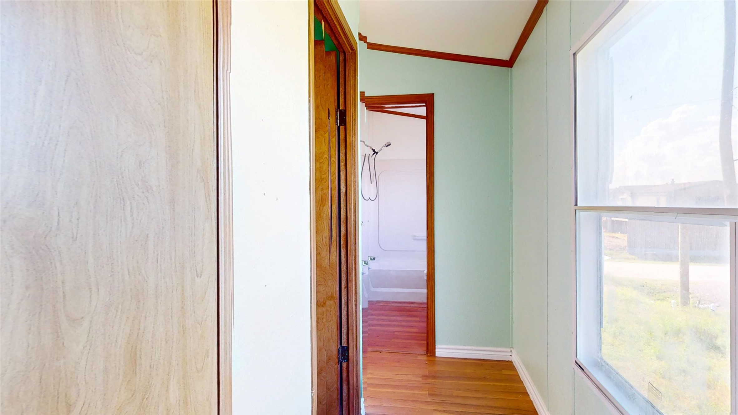 435 16th Street San Leon, TX 77539 - Photo 31 of 44 a view of a hallway with wooden floor