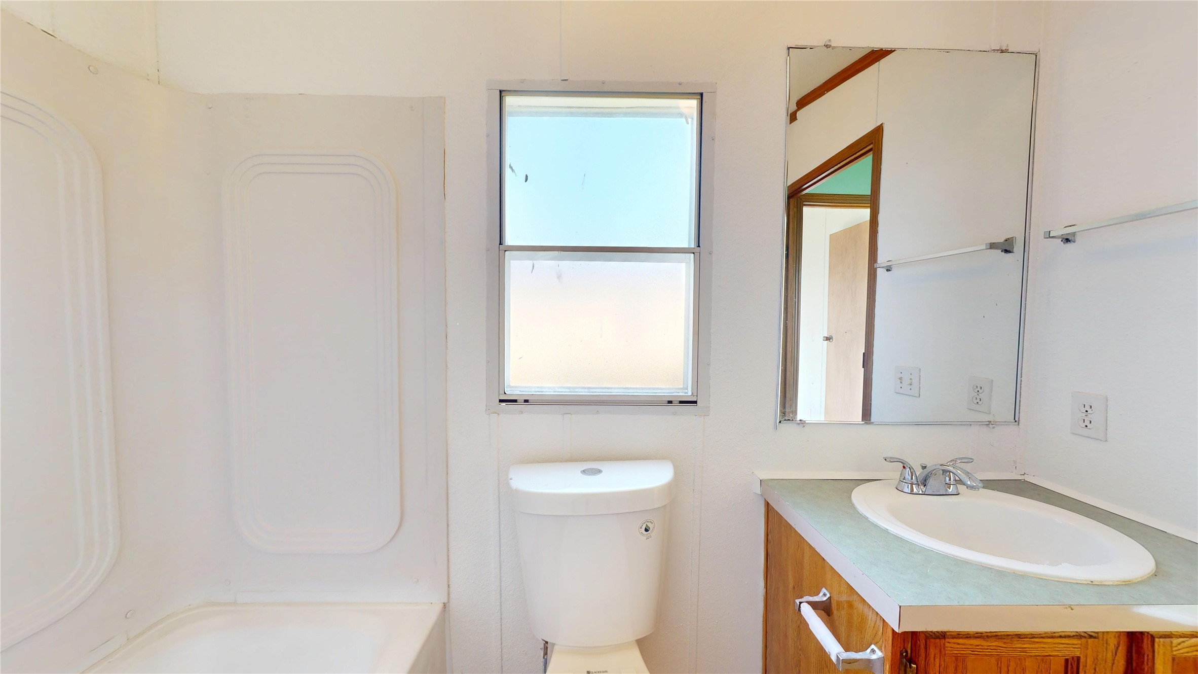 435 16th Street San Leon, TX 77539 - Photo 37 of 44 a bathroom with a sink and a mirror