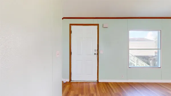 view of an empty room and window