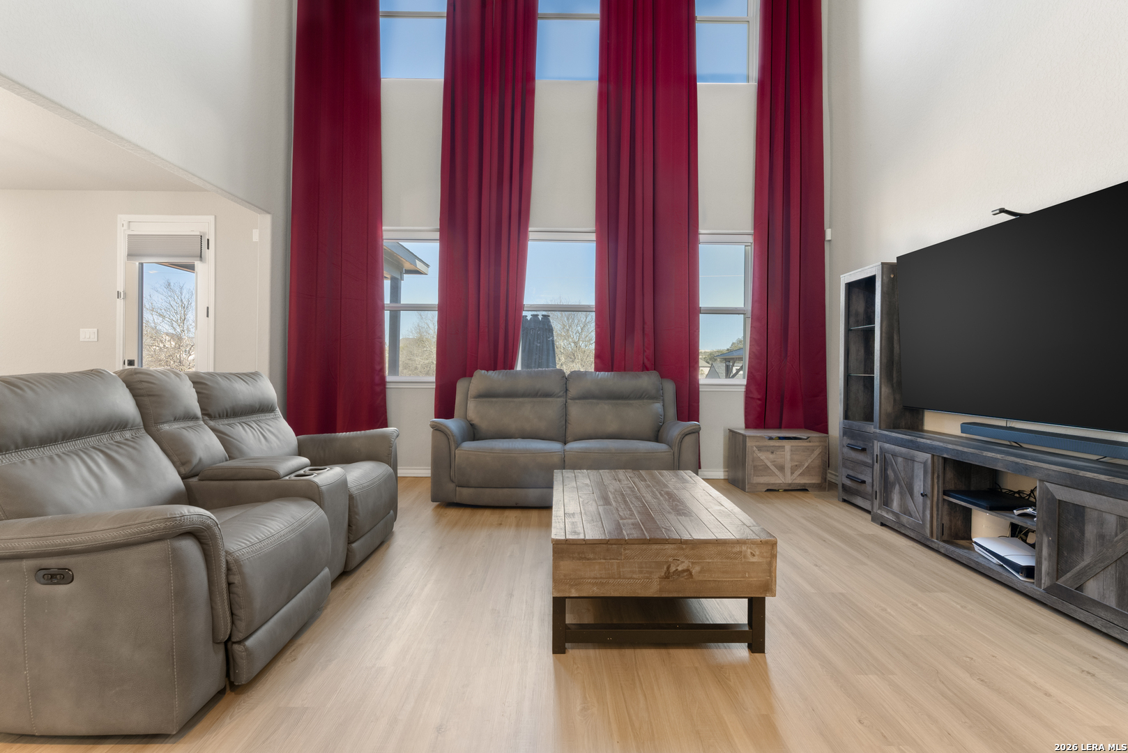 229 Jereth Crossing Castroville, TX 78009 - Photo 11 of 41 a living room with furniture and a flat screen tv