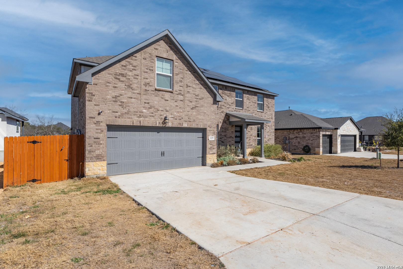 229 Jereth Crossing Castroville, TX 78009 - Photo 3 of 41 a front view of a house with a yard