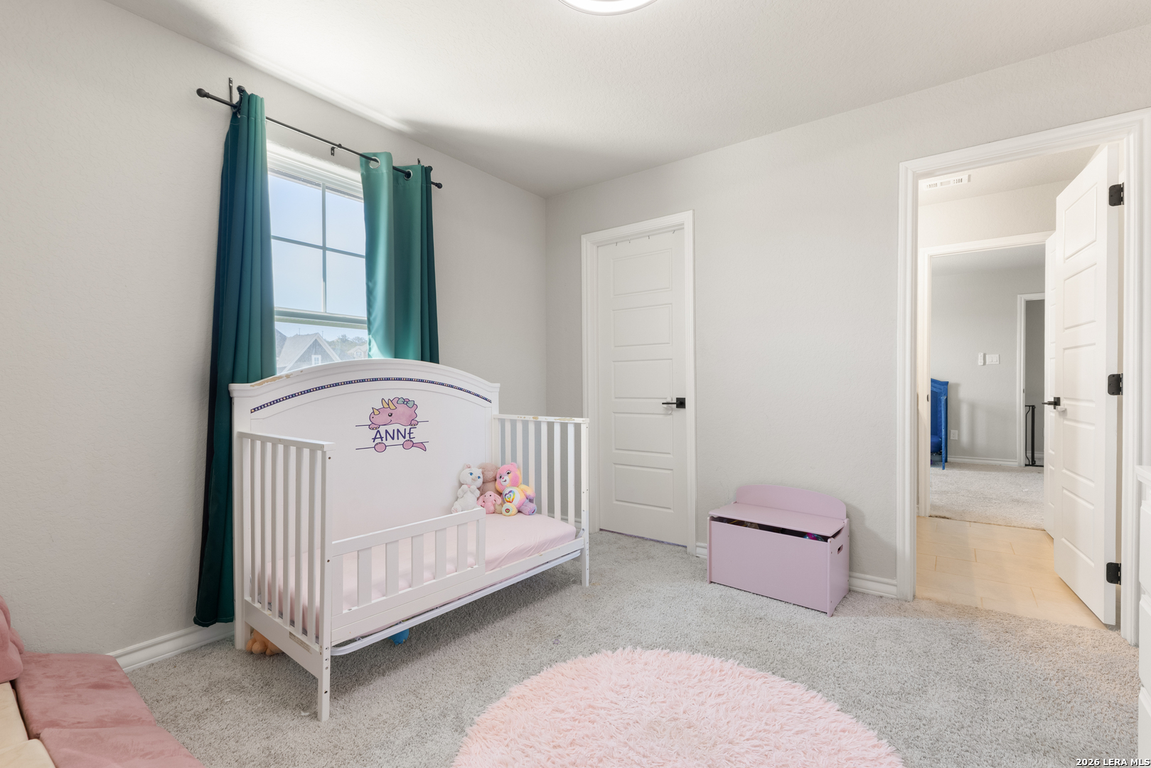 229 Jereth Crossing Castroville, TX 78009 - Photo 34 of 41 a bedroom with a bed and a window