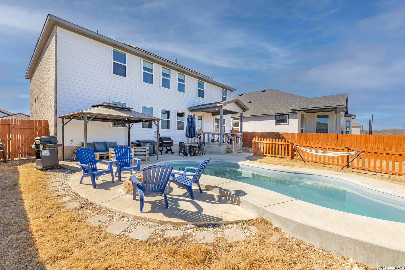 229 Jereth Crossing Castroville, TX 78009 - Photo 39 of 41 a view of a house with swimming pool and sitting area