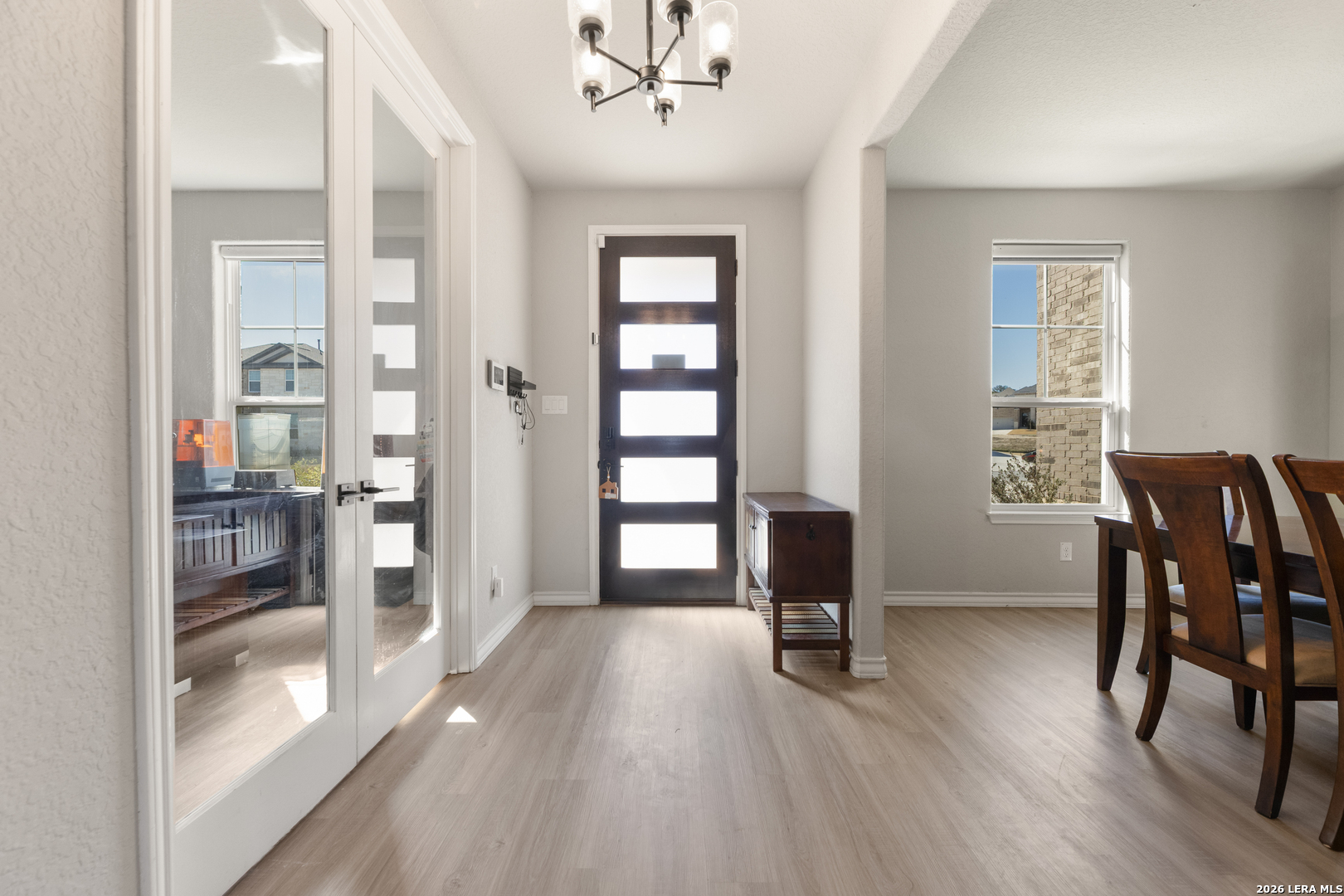 229 Jereth Crossing Castroville, TX 78009 - Photo 5 of 41 a view of a livingroom with furniture and hardwood floor