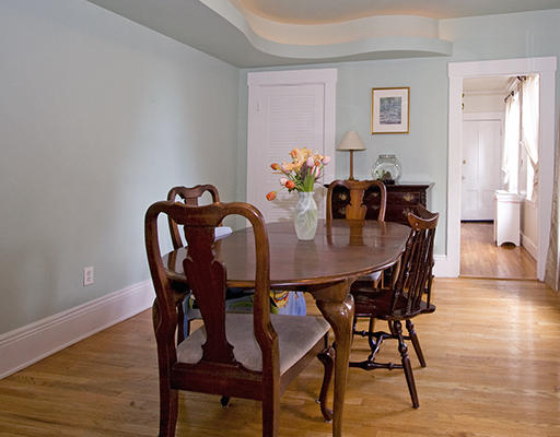267 Bunker Hill Street Boston, MA 02129 - Photo 3 of 14 a view of a dining room with furniture and wooden floor