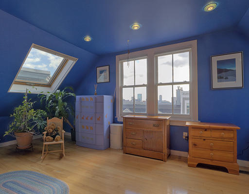 267 Bunker Hill Street Boston, MA 02129 - Photo 5 of 14 a room with furniture and a window