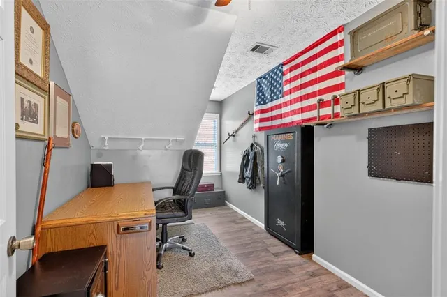 a white toilet sitting next to a bathroom sink and tub