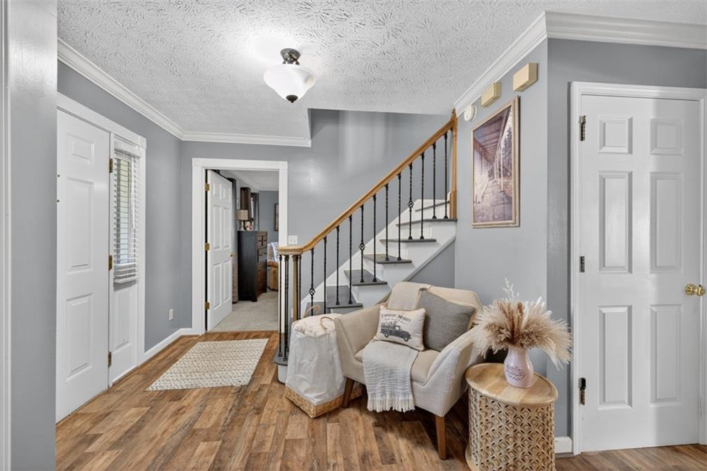 2380 Camp Mitchell Road Grayson, GA 30017 - Photo 4 of 56 a living room with furniture and a fireplace