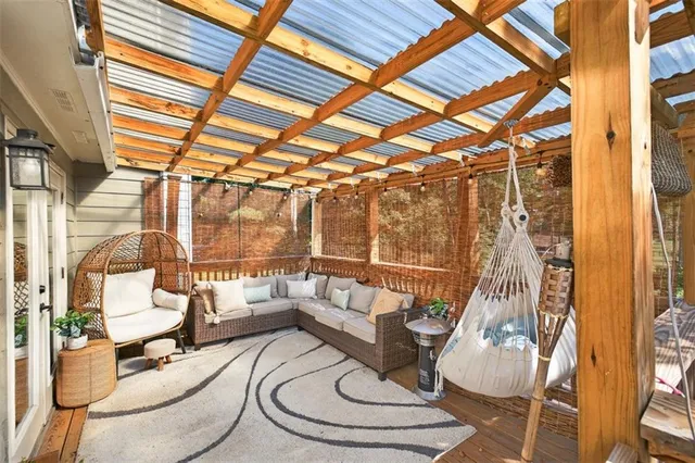 a view of a swimming pool with a patio